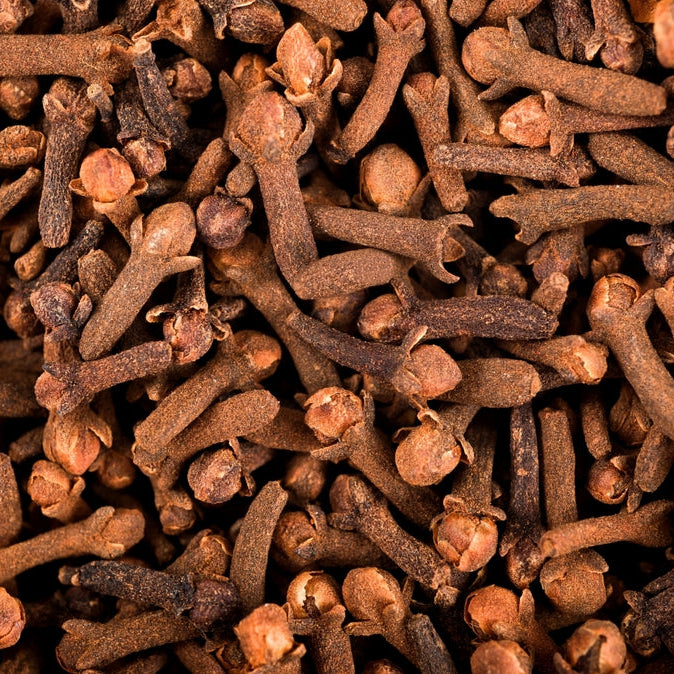 Cloves & orange mini candle in glass votive