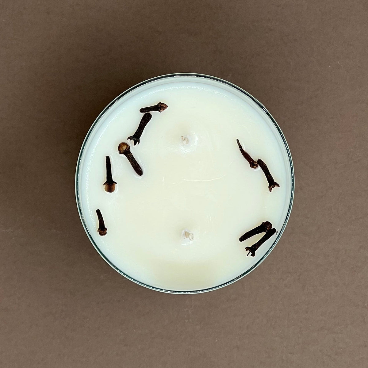 Cloves & orange candle in a glass votive with 2 wicks