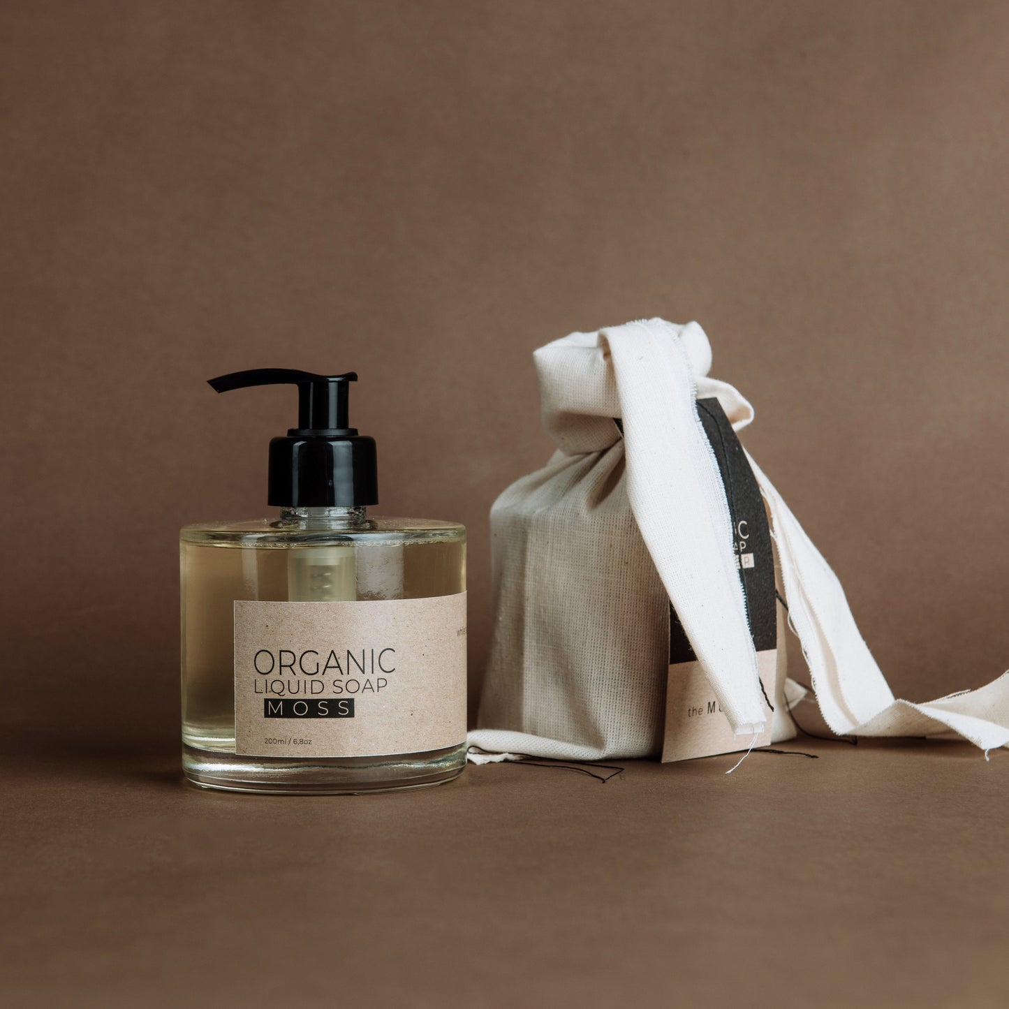 Moss organic liquid soap in glass bottle