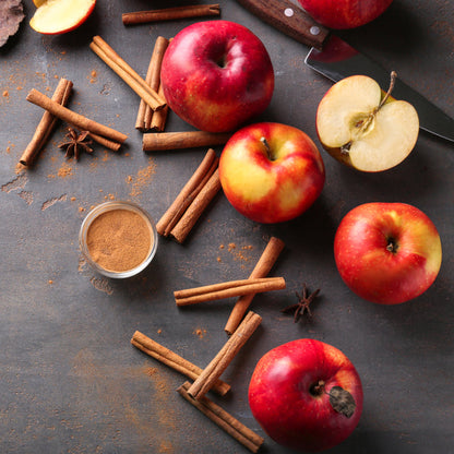 Apple spice candle in a glass votive