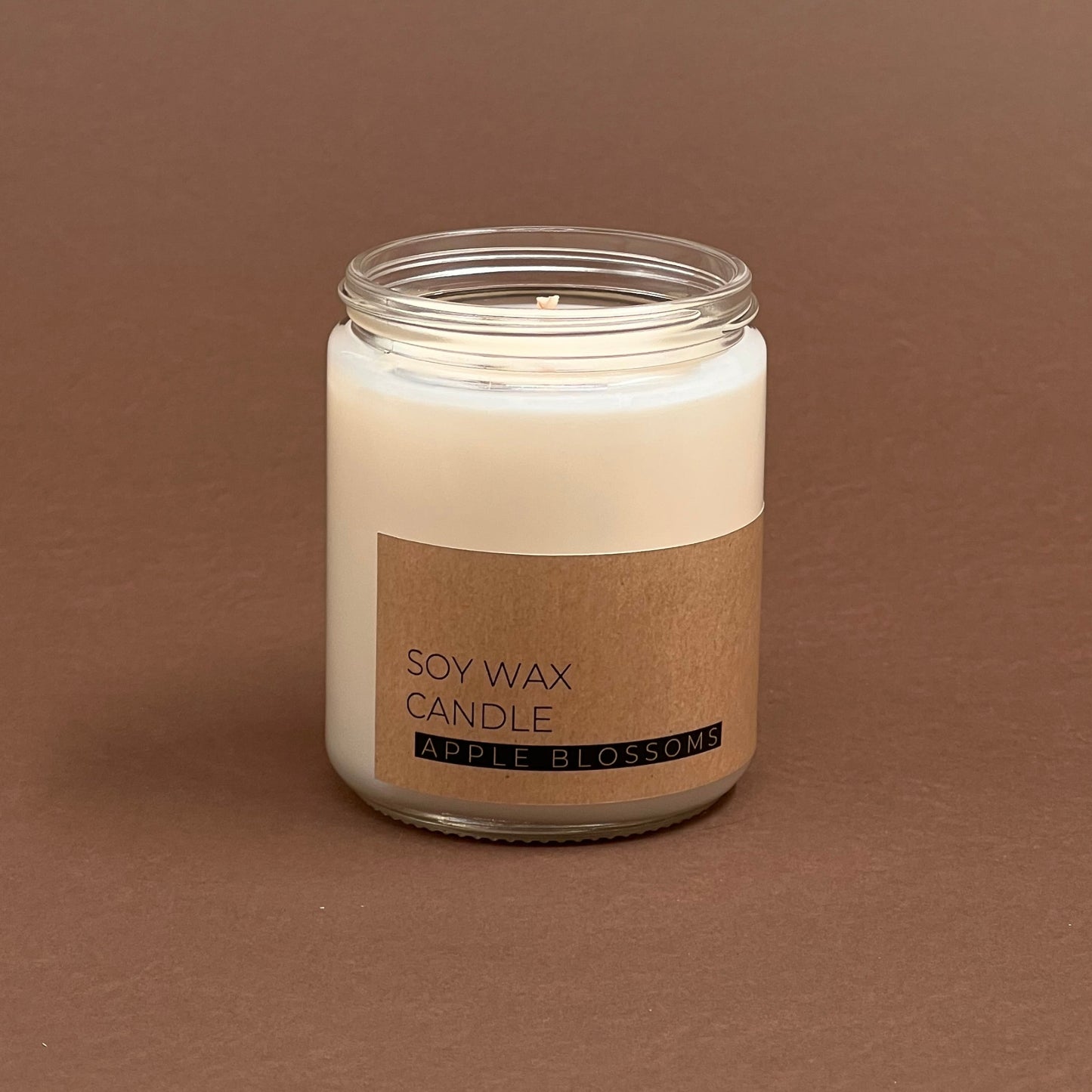 Apple blossoms candle in glass votive