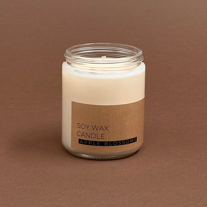 Apple blossoms candle in glass votive