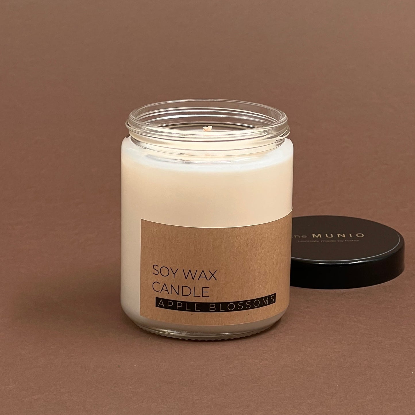 Apple blossoms candle in glass votive