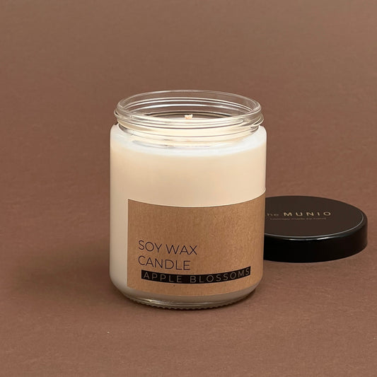 Apple blossoms candle in glass votive