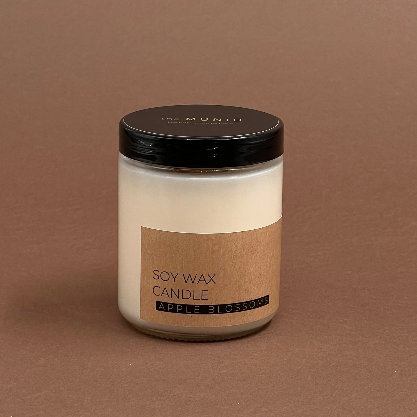 Apple blossoms candle in glass votive