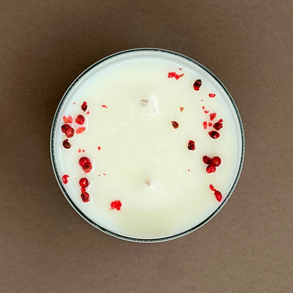 Apple spice candle in a glass votive with 2 wicks