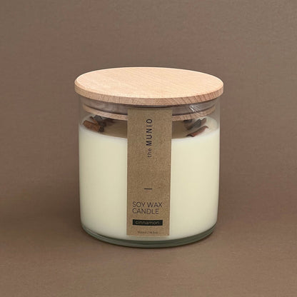 Cinnamon candle in a glass votive with 2 wicks