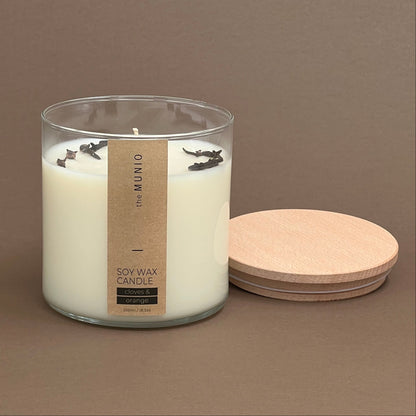 Cloves & orange candle in a glass votive with 2 wicks