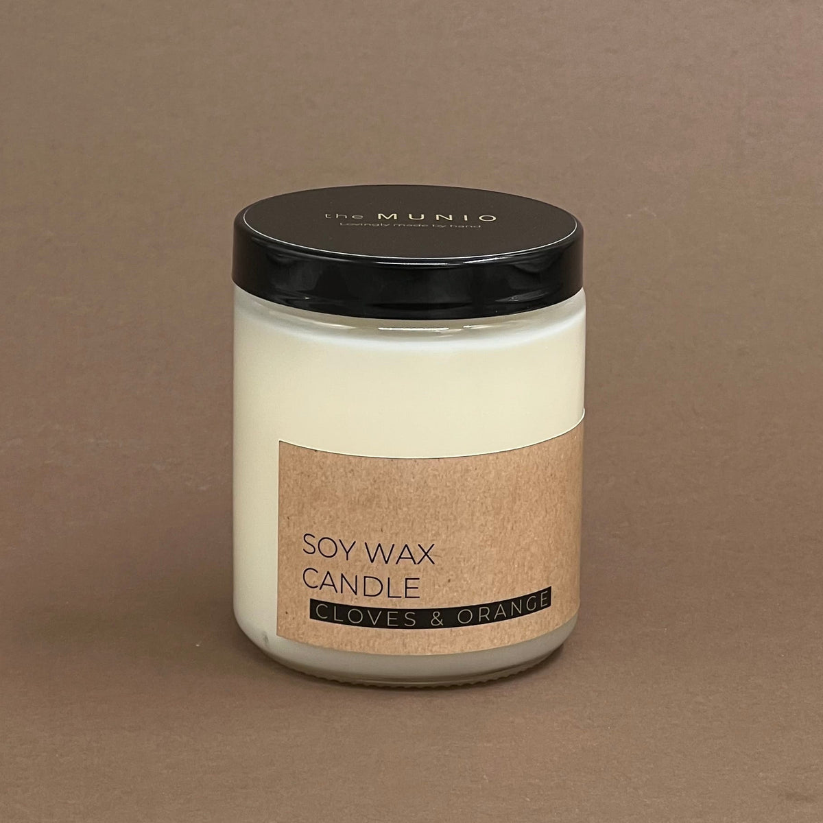 Cloves & orange candle in glass jar