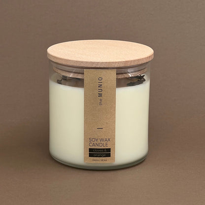 Cloves & orange candle in a glass votive with 2 wicks
