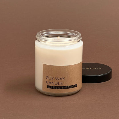 Green meadow candle in glass votive