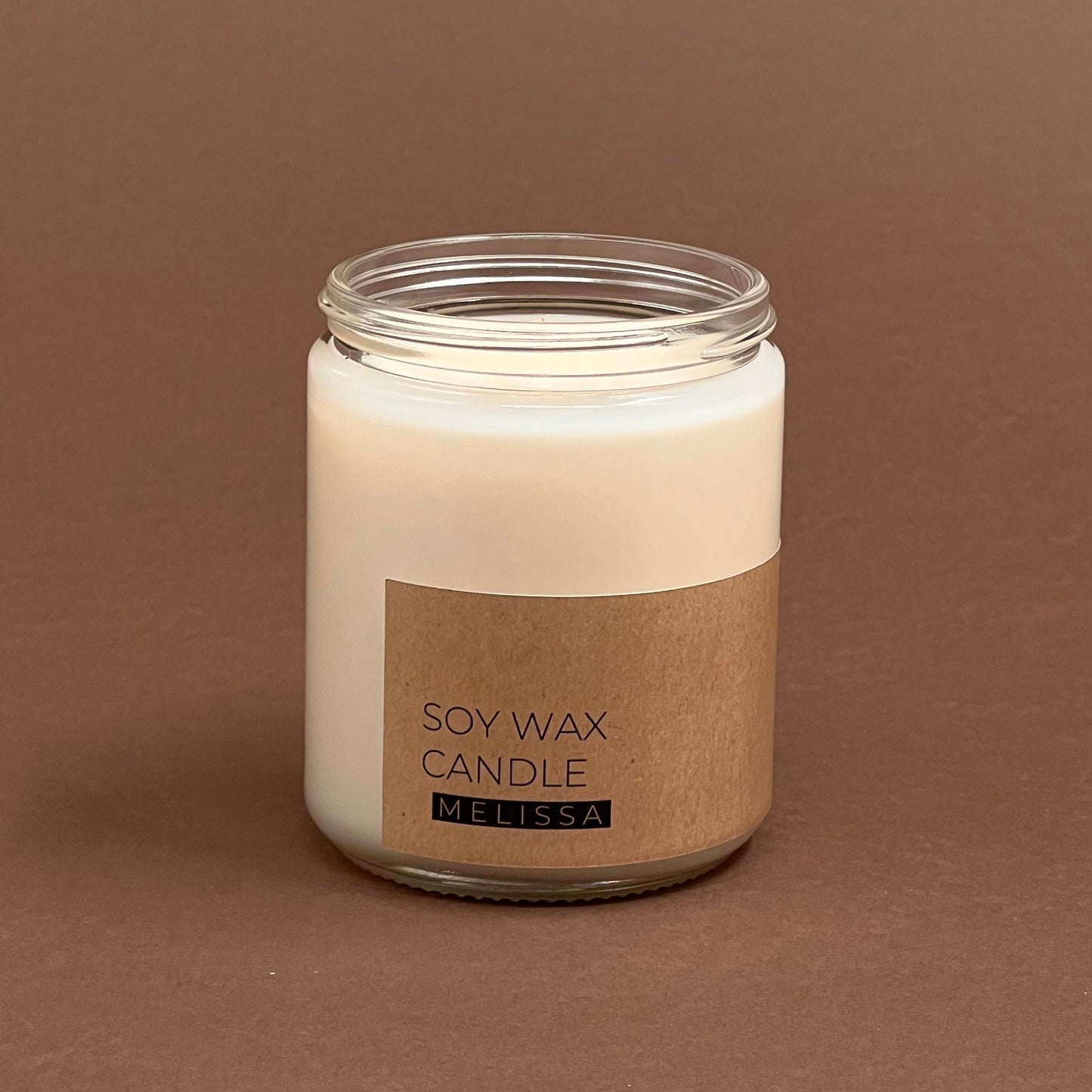 Melissa candle in glass jar