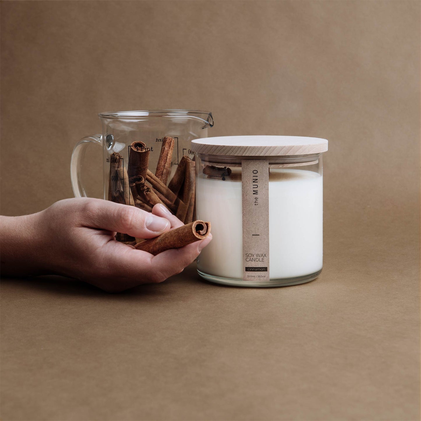 Cinnamon candle in a glass votive