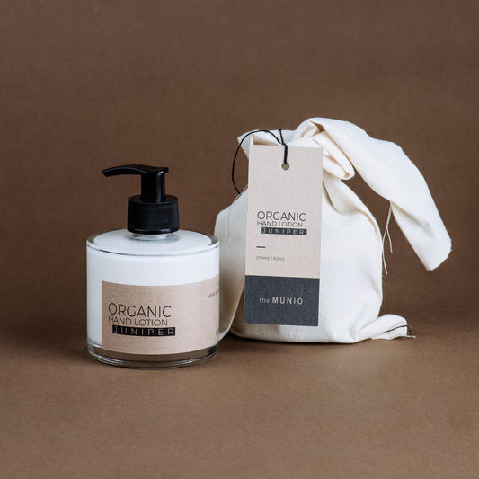 Juniper organic hand lotion in glass bottle
