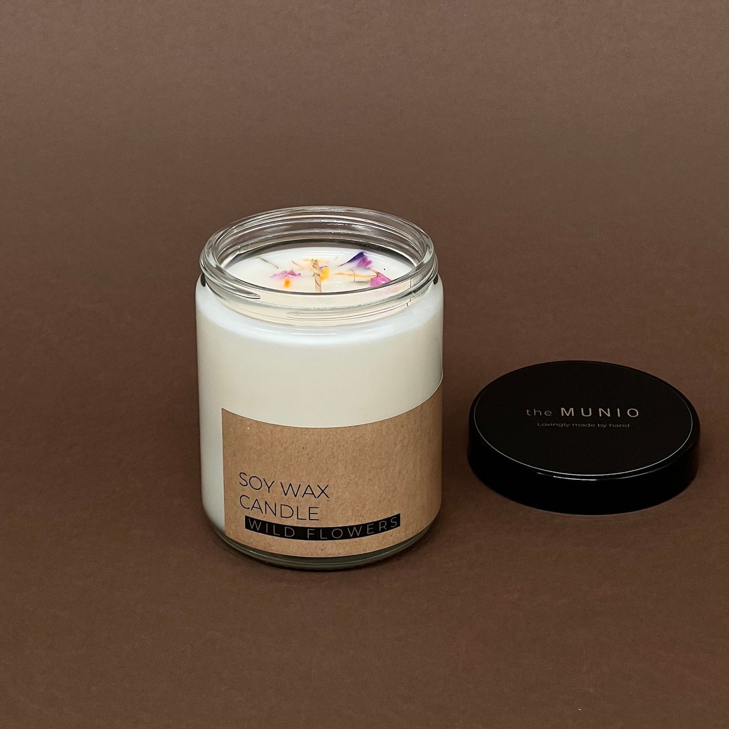 Wild flowers candle in glass jar