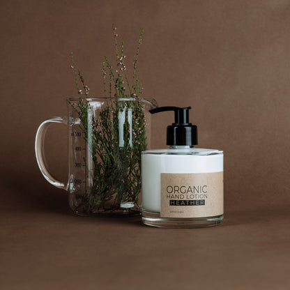 Heather organic hand lotion in glass bottle