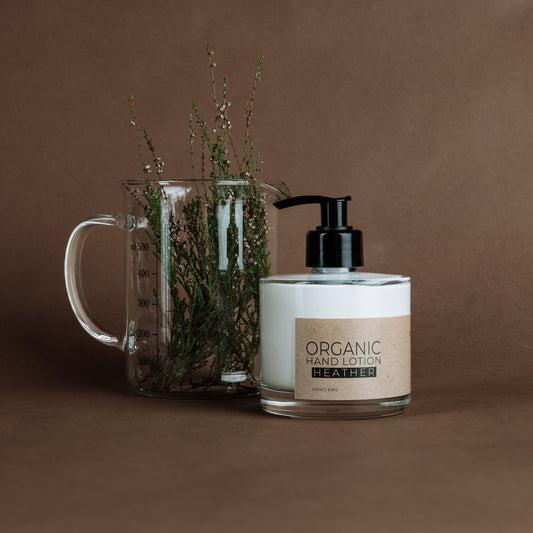 Heather organic hand lotion in glass bottle