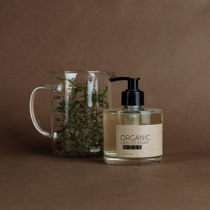 Moss organic liquid soap in glass bottle